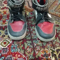 پوتین قرمز مشکی