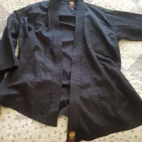 لباس ورزش رزمی تمام مشکی