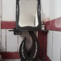 آیینه و کنسول با شمعدان