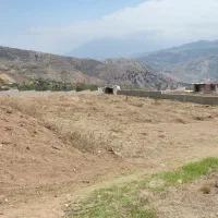 زمین 1600 متر با آب کشاورزی نزدیک به امتیازات