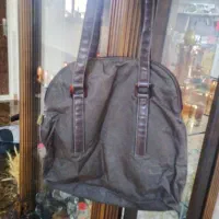 کیف کاپشنی حالت قهوه‌ای طور