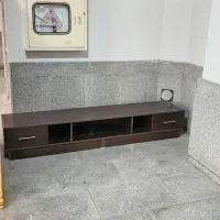 میزتلویزیون نوبزرگ کشودارجاداربوفه طوری گل مصنوعی