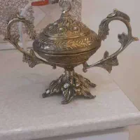 بوفه و ساعت و دکورهای برنزی در حد نو|صنایع دستی و سایر لوازم تزئینی|اسلام‌شهر, شهرک لاله|دیوار