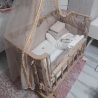 تخت نوزاد نی نی لای لای
