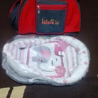 ساک بچه قنداق سوئیسی و کیسه خواب نوزاد