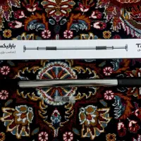میله بارفیکس قابل تنظیم روی چارچوب در