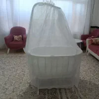 گهواره چوبی بیضی شکل