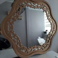 آینه دکوراتیو طلایی