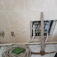 کلنگ و بالابر و طنابه محکم و ضخیم بالابر