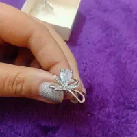 گوشواره استیل رنگ نقره ثابت تضمینی طرح پاپیون نگین