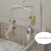آویز موزیکال همراه با عروسک