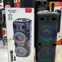 اسپیکر همراه اسپیکر بلوتوثی اسپیکر