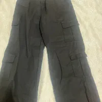 یک عدد شلوار لی ترک و دو عدد شلوار کارگو
