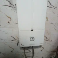 ابگرم کن بوتان شمعک دار سالم کار کردعالی