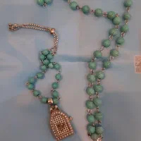 ست رولباس و دستبند ساعتی مرغ آمین