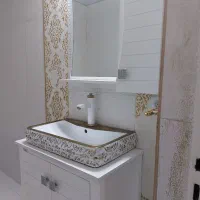 روشویی  نونو همراه با کابینت وشیر آلات