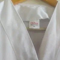 روپوش سفید|لباس|نیشابور, بنیاد شهید|دیوار