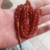 تسبیح کهربا اب حیاطی رنگ آورده فاتح اصل