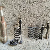 کمک فنر اسپورت پراید با اگزوز و یک کمک عقب پراید
