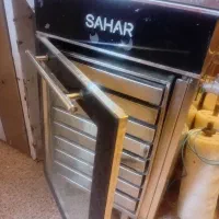 پیراشکی دونات سرخ کن آلمانی زن دم خونه غلطک قیفی