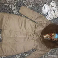 یک جفت کتانی و یک پالتوی زمستانی