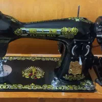 چرخ خیاطی برقی مرد پرنده