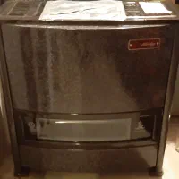 بخاری گازی قدیمی  کاملا نو...جهانکار مدل ۹۰۰۰