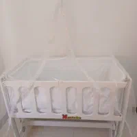 کنار تختی نوزاد