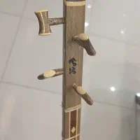 سه تار ستار ساخت استاد مرآتی|سازهای سنتی|تهران, فلسطین (میدان انقلاب)|دیوار