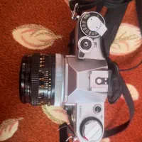 دوربین آنالوگ Canon Ae1 . همراه با لنز CANON|دوربین عکاسی و فیلم‌برداری|تهران, امیرآباد|دیوار