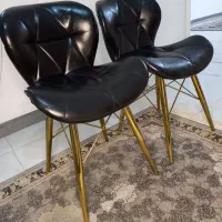 صندلی چرم مشکی پایه طلایی نو