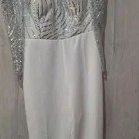 یه دست لباس جشن دخترانه نونوهست به قیمت یک تومان