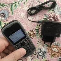 Nokia (فنلاندی) N1280 نقرهای سال 2009 اصلی قدیمی.|موبایل|بوکان, |دیوار