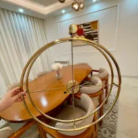 ساعت دیواری ابکاری طلایی