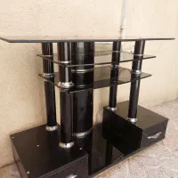 میز تلویزیون شیشه کارکرده