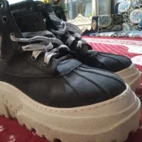 کفش کتانی ساق دار