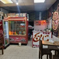 فروش تمام لوازم ساندویچی باپیتزا و دکور مغازع