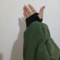 کاپشن|لباس|تربتحیدریه, آغوی|دیوار