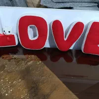 تعدادی عروسک پولیشی و اسباب بازی و فیل چرخدار