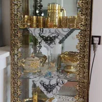 بوفه ساعت ایستاده و زیر تی وی برنز