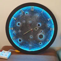 ساعت و تابلو ماه شبتاب