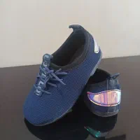 کفش بچگانه|کفش و لباس بچه|کاشان, دروازه جوشقان|دیوار