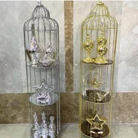 استند قفس تزئینی و دکوری کنار سالنی فلزی سه طبقه