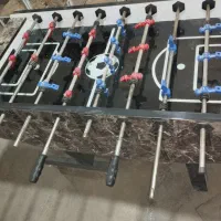 یک عدد فوتبال دستی کف شیشه‌ای