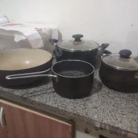 وسایل پخت و پز قابلمه قوری ظروف کفگیرملاقه