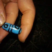 مهره لول تبتی|اشیا|مشهد, شهید علی محمدی|دیوار