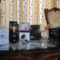 شیشه های خالی عطر با جعبه اصلی