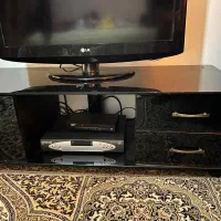 زیر تلویزیون شیشه ای