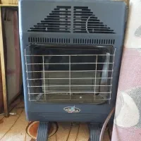 بخاری بدون دودکش تخت تلویزیون باند فرش پرده تابلو