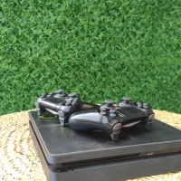 یک عدد ps4 اسلیم یک ترابایت کپی خور دو دسته